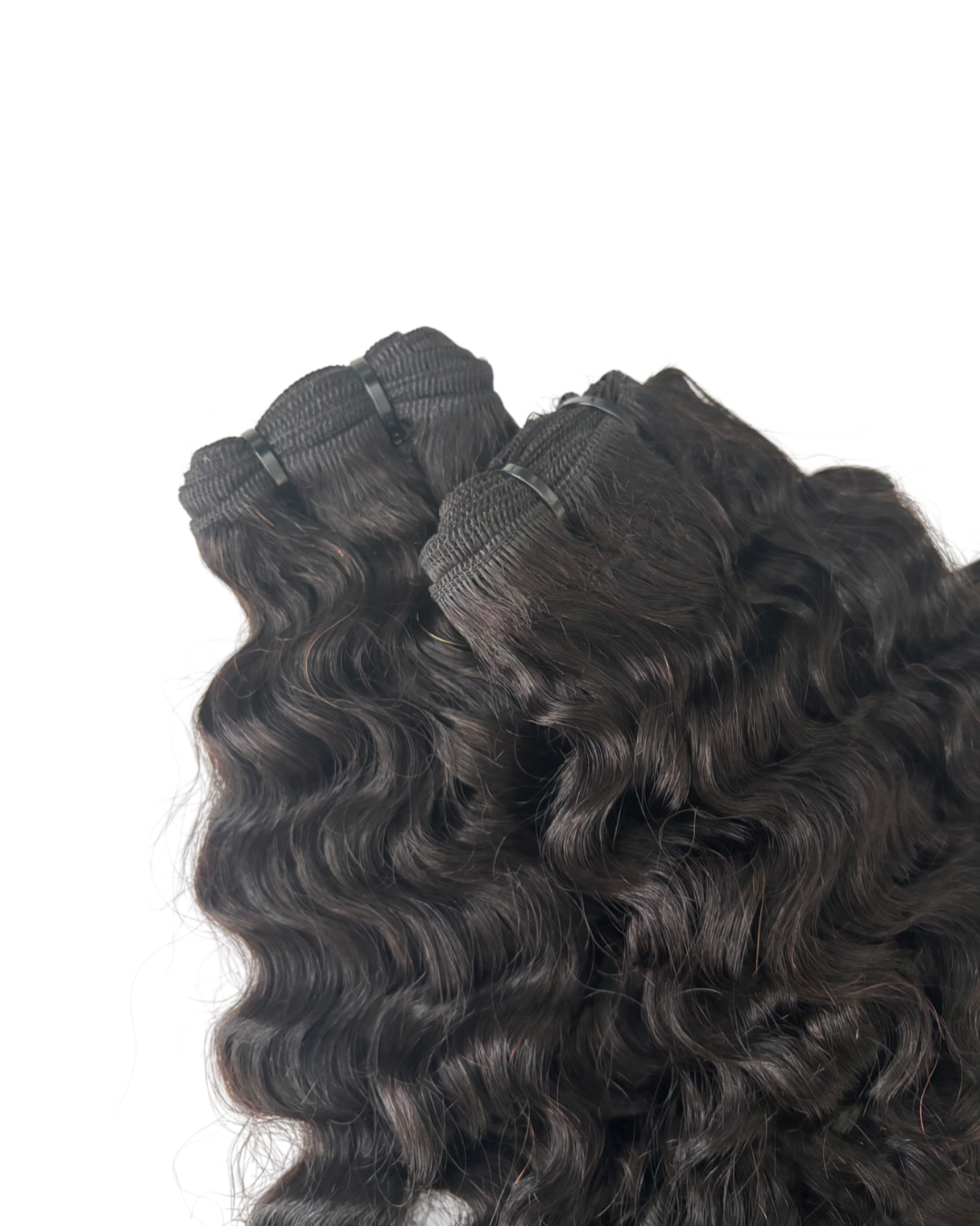 Burmese curly hair extensions on a white background