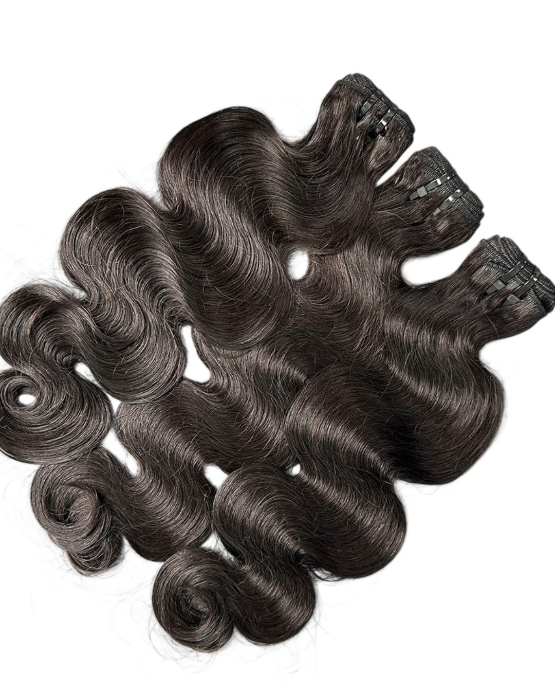Set of black hair extensions on a white background