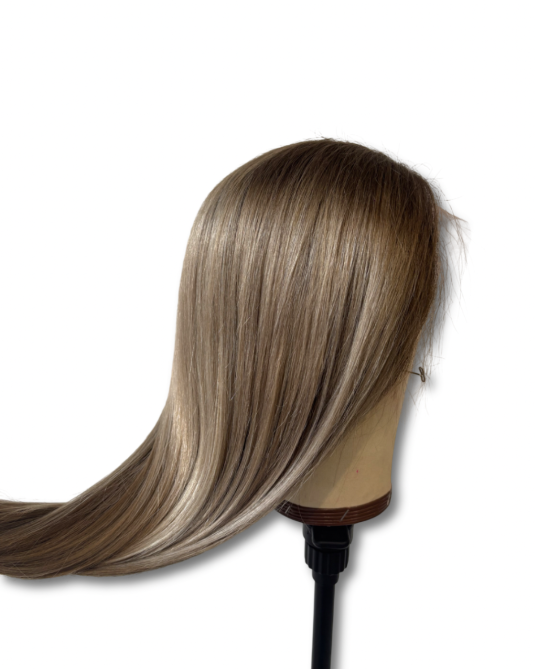 Mannequin head with long beige blonde hair on a white background