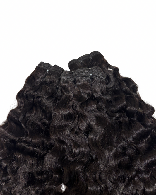 Burmese curly bundles on a white background