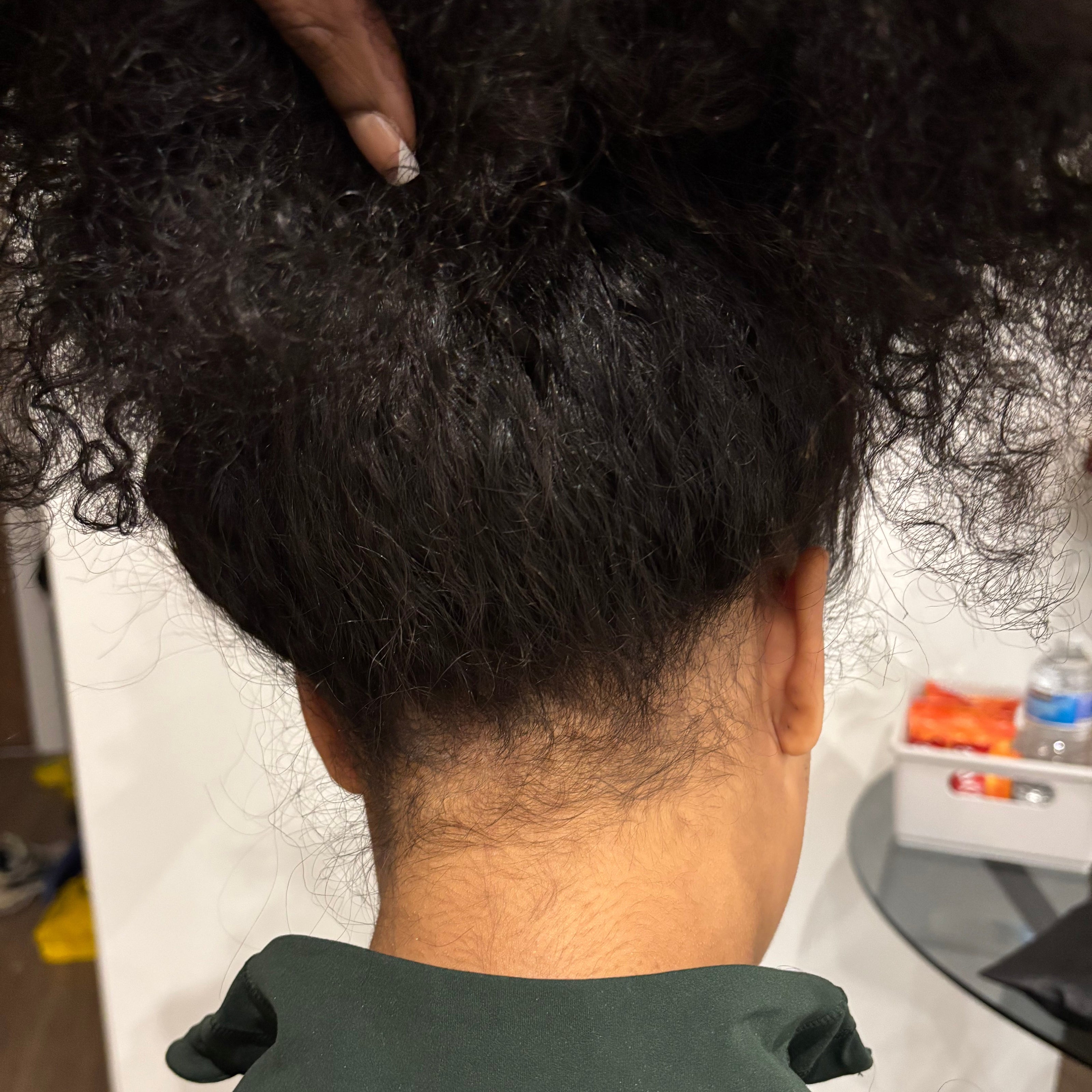 Versatile sew-in held up to show the blend